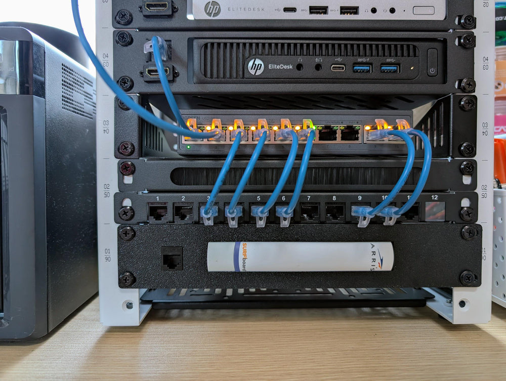 Homelab gear mounted in a 19-inch rack